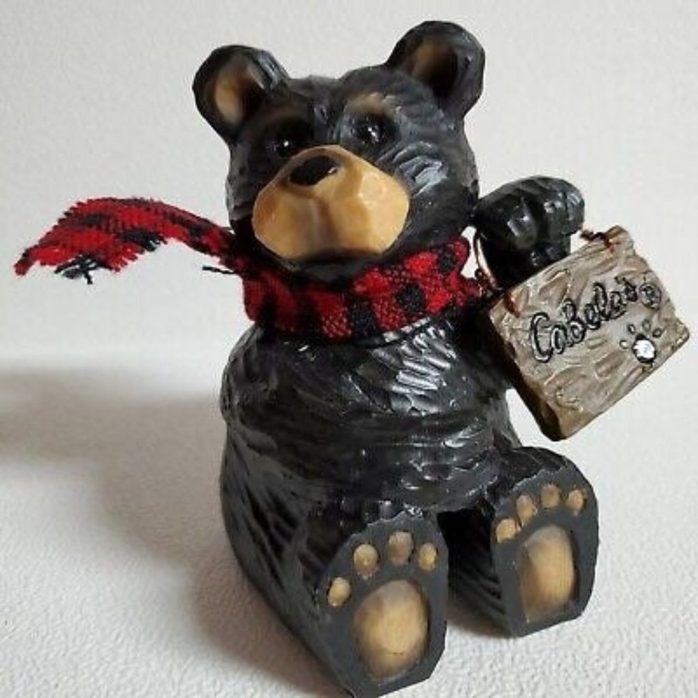Black Bear Figurine Holding Cabela’s Store Sign in Paw Red & Black Fringe